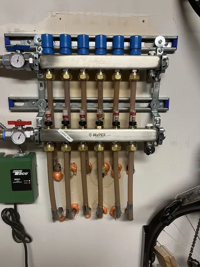 Plumber performing Gas Line Installation at a residential property in Hutchinson